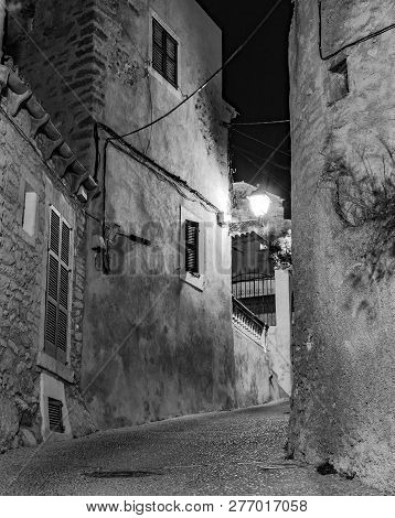 Spain Majorca, Idyllic View Of The Old Town Capdepera At Night
