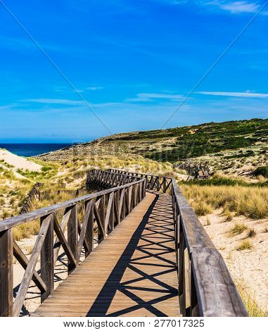 Wooden Boardwalk Through The Sand Dunes Of Cala Mesquida, Majorca Spain, Balearic Islands