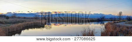 Iews Of Joshs Pond Walking Path, Reflecting Sunset In Broomfield Colorado Surrounded By Cattails, Pl