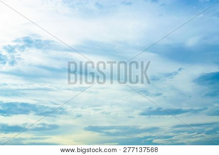 White Clouds In Blue Sky With Variable Weather.