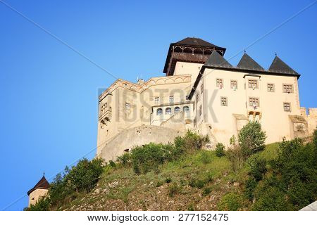 Castle In Trencin, Slovakia In Povazie Region. Medieval Fortress On A Hill.