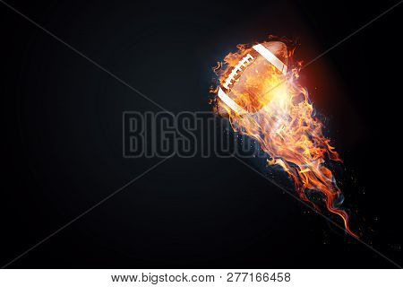 American Football Game. Soccer Ball Enveloped By Fire. The Concept Of Sport, Wrestling, Speed, Oppos