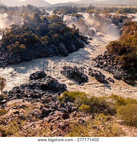 Famous Epupa Falls On The Kunene River In Northern Namibia And Southern Angola Border. Sunrise Sunli