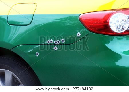 The Marks Bullets Hole On The Car Bonnet, Shrapnel Bullet Shot Cracked Hole On Car Surface,  Shoot T