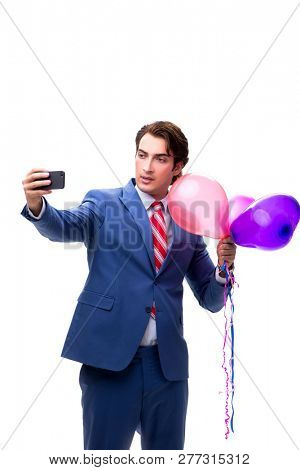 Elegant businessman with balloons isolated on white