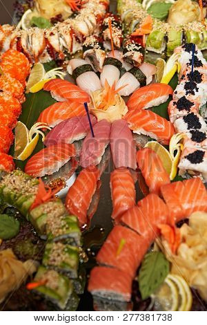 Decorated Catering Banquet Table With Different Sushi Rolls And Nigiri Sushi Plate Assortment On A P