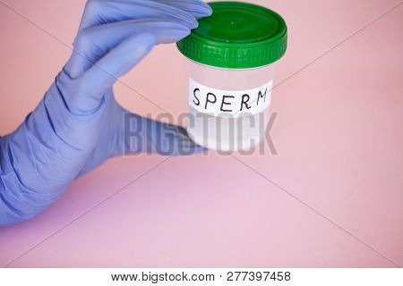 Health. Sperm Analysis. Concept Of Bank Sperm. Infertility. Doctors Hand Holding Container For Analy