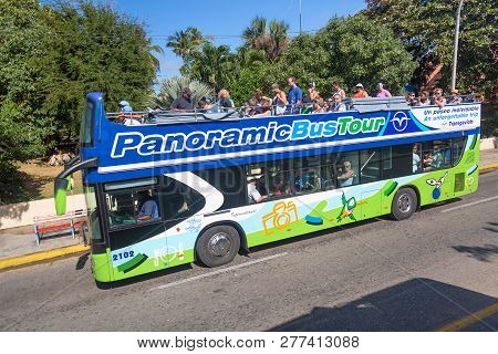 Varadero, Cuba - November, 2018: Varadero Green Beach Tour Bus In Cuba. Red And Green Panoramic Buse