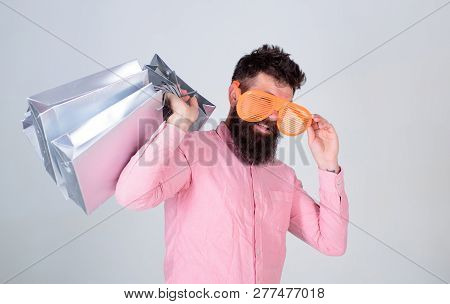 Shopping Addicted Consumer. How To Get Ready For Your Next Vacation. Man Bearded Hipster Wear Sungla