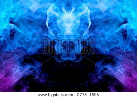 Dense Multicolored Smoke Of   Blue And Purple Colors In The Form Of A Skull, Monster, Dragon On A Bl