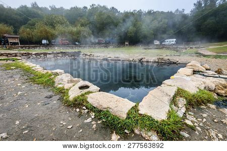 Natural Roman Baths Outdoors With Hot Steam And Thermal Water.
