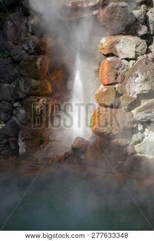 Beppu, Japan - November 2, 2018: Tatsumaki Jigoku geyser, a natural monument, on the hell tour in Beppu