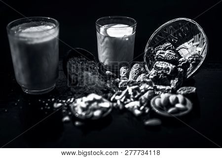 Close Up Of Popular Indian And Asian Winter Drink On Wooden Surface I.e. Kharek Ka Dudh Or Dried Dat