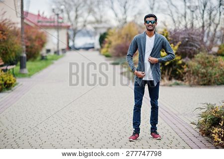 Stylish Indian Man At Sunglasses Wear Casual Posed Outdoor.