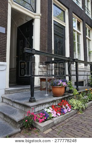 Amsterdam Residential Street - Generic Old House Ornate Door. Netherlands Rowhouse.