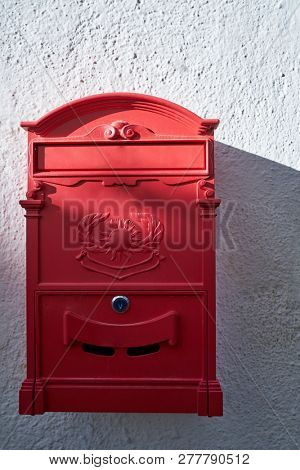 red mailbox in albayzin granada