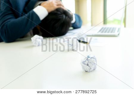 Businessman Sit At The Table Fill Sad And Headache