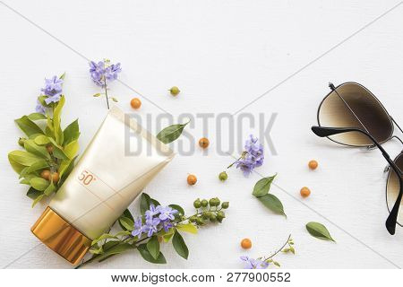 Natural Cosmetics Sunscreen Spf50 For Health Care Skin Face With Sunglasses Of Lifestyle Woman Relax