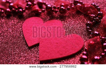 Two Red Hearts Close Up With Blur Effect
