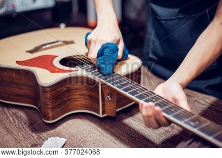 Acoustic Guitar Repair Service, Cleaning The Acoustic Guitar, Close-up