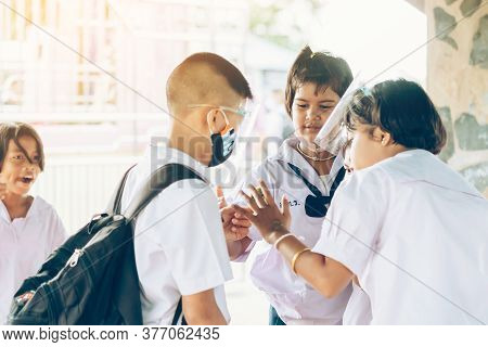 Kanchanaburi,thailand-july 2,2020:unidentified Elementary School Students Wear Face Mask To Prevent 