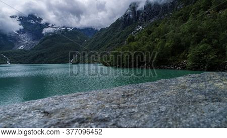 Green Water From Melting Of Norwagian Glacier, Scandinavian Nature