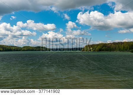 Terlicko Water Reservoir In Czech Republic During Windy Sprringtime Day With Blue Sky And Clouds