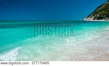 The Bay Of Portonovo With The Conero Mount In The Background In A Beautiful Summer Day
