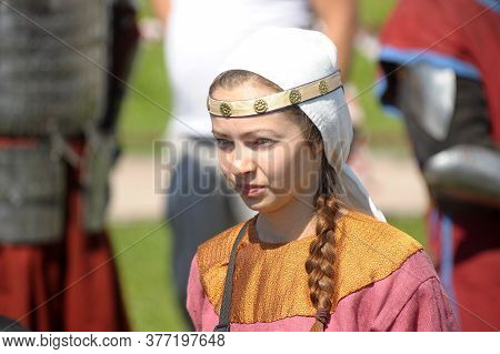 Russia, St. Petersburg 23.06.2012 A Woman In Casual Clothes Of The Vikings At The Historical Reconst