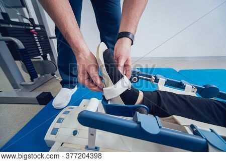 Patient On Cpm Machines. Continuous Passive Range Of Motion.