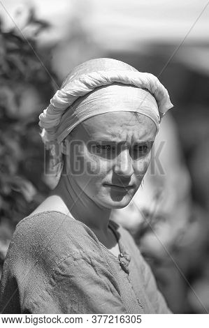 Russia, St. Petersburg 23.06.2012 A Woman In Casual Clothes Of The Vikings At The Historical Reconst