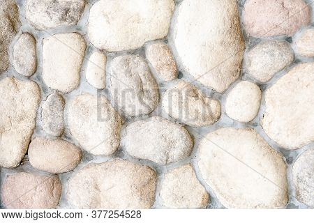 Concrete Stown Wall Or Walkway. Abstract Background Texture. Close Up.