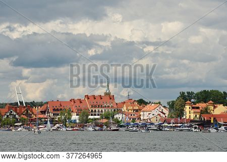 Mikolajki, Poland, July 12: View To City From The Lake On July 12, 2020 At Mikolajki, Poland. Mikola