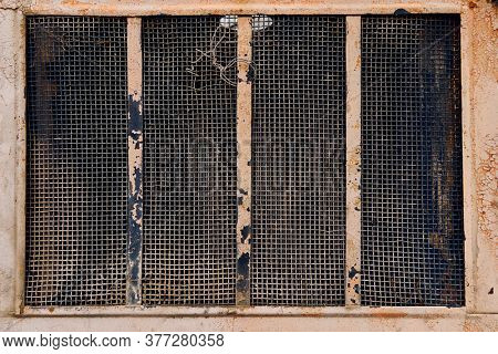 radiator grille close view of old tractor parts as background