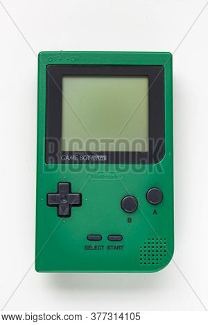 Calgary, Alberta, Canada. July 20, 2020. Green Gameboy Pocket On A White Background