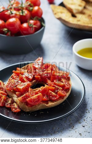 Concept Of Italian Food. Friselle With Tomato, Oil And Origano. Closeup Image With Selective Focus
