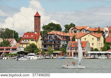 Mikolajki, Poland, July 12: View To City From The Lake On July 12, 2020 At Mikolajki, Poland. Mikola