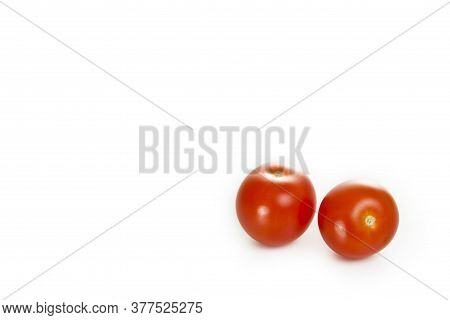 Fresh Cherry Tomatoes On A White Background
