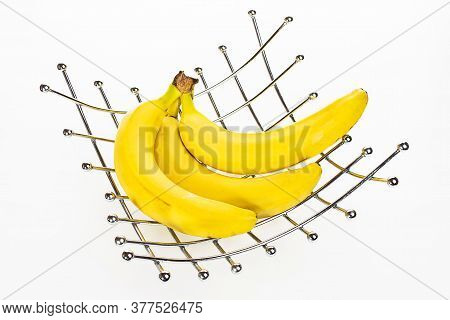 Bunch Of Bananas In Basket On White Background