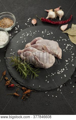 Raw Quail Meat On Kitchen, Cooking Gourmet Bird. Healthy Diet Recipe.