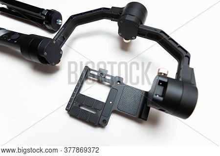 Dslr Camera Gimbal Three-axis Motorized Stabilizer Tripod System On A White Background, Isolated