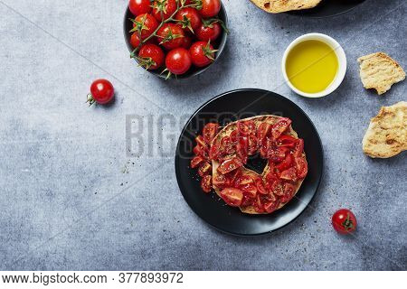 Concept Of Italian Food. Friselle With Tomato, Oil And Origano. Top Down View With Copy Space