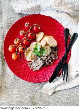 Beef meat stewed with potatoes-Traditional French cuisine Beef Bourguignon potatoes carrots in persillade