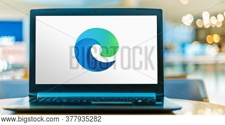 POZNAN, POL - MAY 15, 2020: Laptop computer displaying logo of Microsoft Edge, a web browser develop
