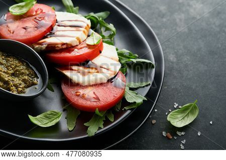 Caprese Salad. Italian Caprese Salad With Sliced Tomatoes, Mozzarella Cheese, Arugula, Basil, Olive 