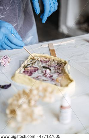 Epoxy Resin Art. Creating Art With Resin On Workshop. The Art Process Of Creating Epoxy Resin Handma