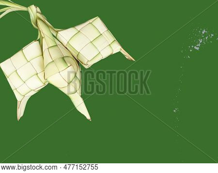 Closeup Up White Ketupat Ramadan On Light Green Background. Ketupat Frame Of Idul Fitri Traditional.