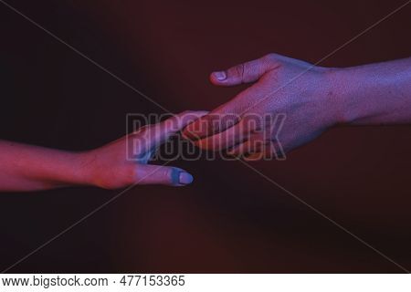 Helping Hand. Holding Hands, Close Up. Giving A Helping Hand. Rescue, Helping Gesture Or Hands. Salv