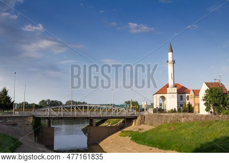 Brcko, Bosnia - June 18, 2016: Panorama Of The Atik Savska Dzamija Mosque Over The Brka River. It's 