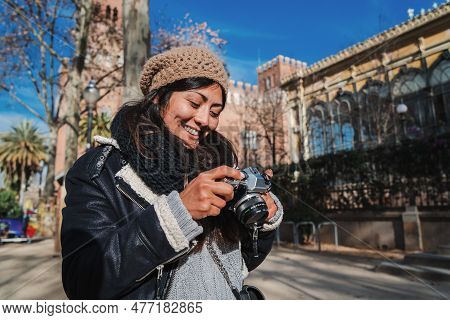 Happy Young Woman Sightseeing On A Jouney Trip Tacking Pictures On Holiday. Cute Tourist Photographe